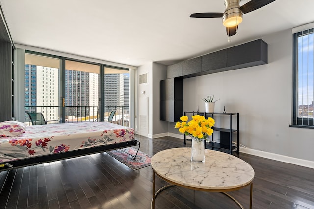 3660 N Lake Shore Dr Unit 711, Chicago, IL 60613 - bedroom featuring dark wood finished floors, baseboards, and multiple windows