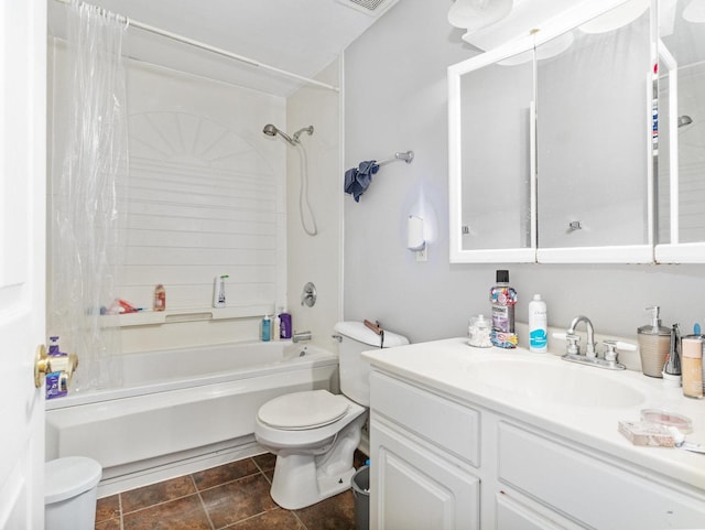 bathroom featuring shower / bath combination, vanity, and toilet