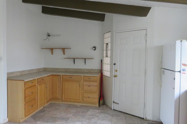 1921 W Hood Ave Unit 3B, Chicago, IL 60660 - kitchen featuring freestanding refrigerator, open shelves, light tile patterned flooring, vaulted ceiling with beams, and light countertops