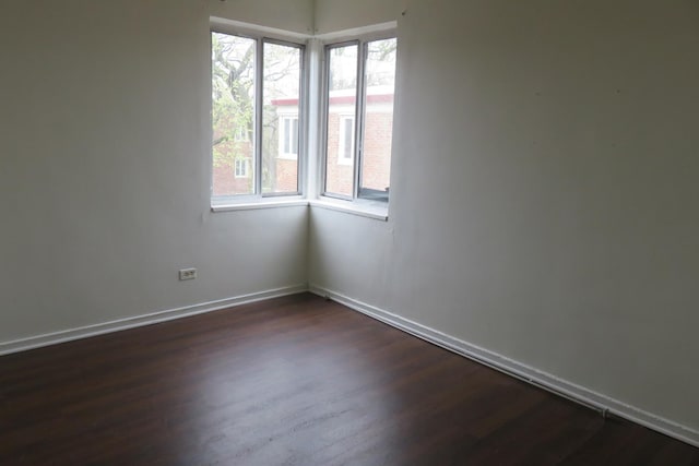 1921 W Hood Ave Unit 3B, Chicago, IL 60660 - spare room with baseboards and dark wood finished floors