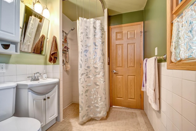 13344 S Stephen Dr, Palos Park, IL 60464 - bathroom with tile walls, vanity, tiled shower, tile patterned floors, and a wainscoted wall