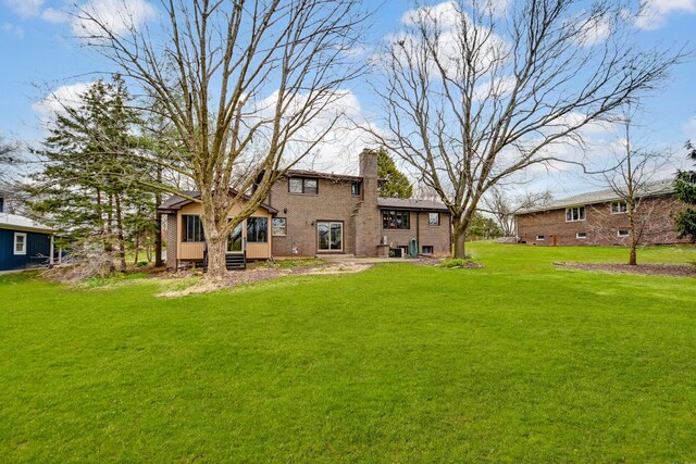 13344 S Stephen Dr, Palos Park, IL 60464 - rear view of property with a chimney and a yard