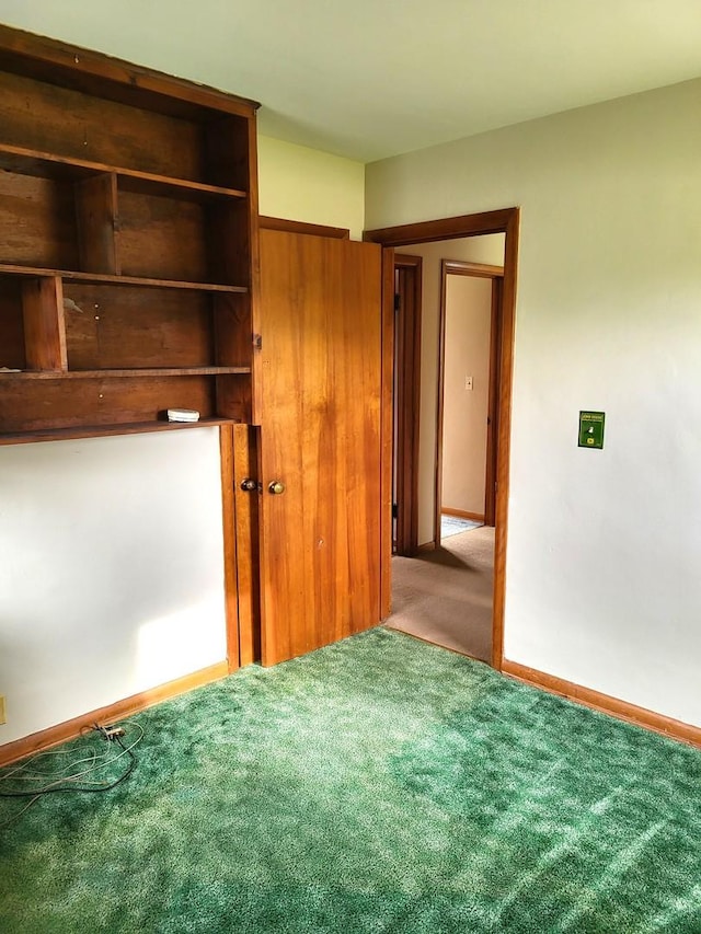 5890 S Il Route 2, Oregon, IL 61061 - unfurnished bedroom featuring carpet flooring