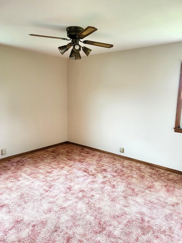 5890 S Il Route 2, Oregon, IL 61061 - unfurnished room with carpet flooring, ceiling fan, and baseboards