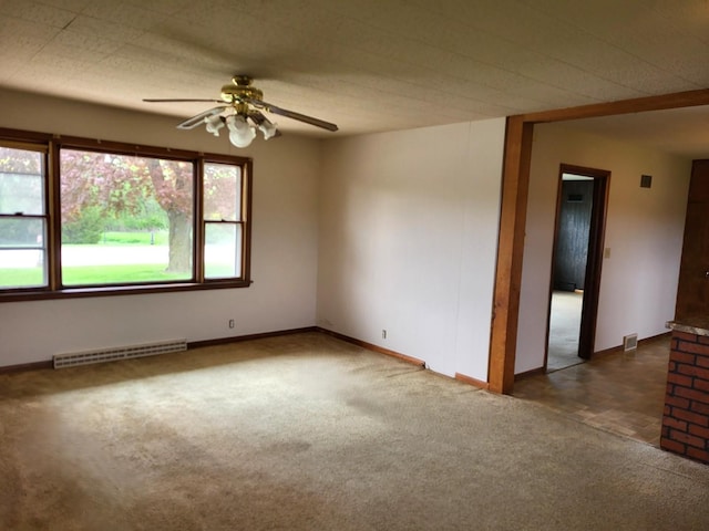 5890 S Il Route 2, Oregon, IL 61061 - unfurnished room featuring a ceiling fan, baseboards, visible vents, and carpet