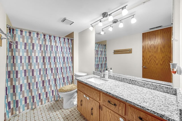 full bathroom with visible vents, a shower with curtain, toilet, vanity, and tile patterned flooring