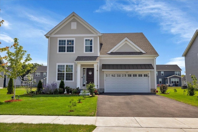 traditional home featuring aphalt driveway, a garage, central air condition unit, a front yard, and a shingled roof