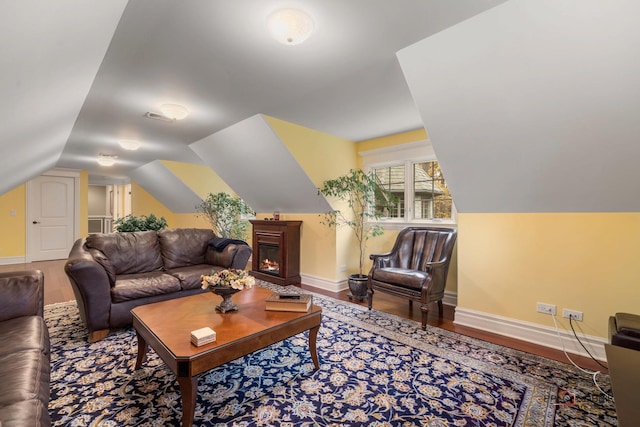 14705 W Mayland Villa Rd, Lincolnshire, IL 60069 - living room featuring baseboards, vaulted ceiling, and wood finished floors