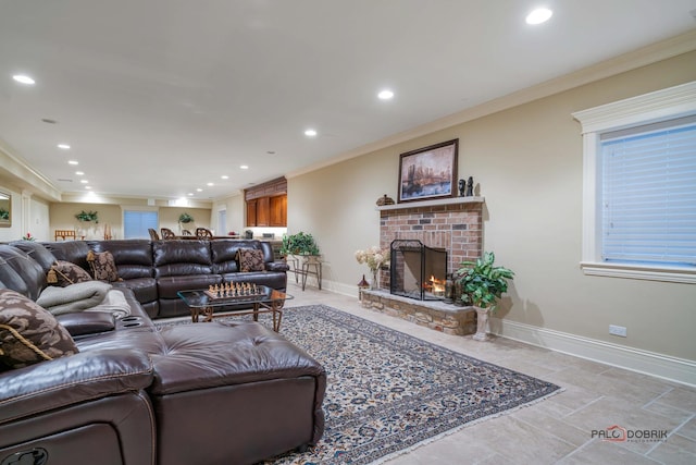 14705 W Mayland Villa Rd, Lincolnshire, IL 60069 - living room with ornamental molding, a brick fireplace, recessed lighting, baseboards, and light stone finish flooring