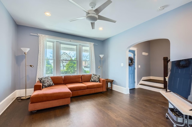 7525 S Crandon Ave, Chicago, IL 60649 - living room featuring baseboards, recessed lighting, a ceiling fan, a fireplace, and dark wood-type flooring