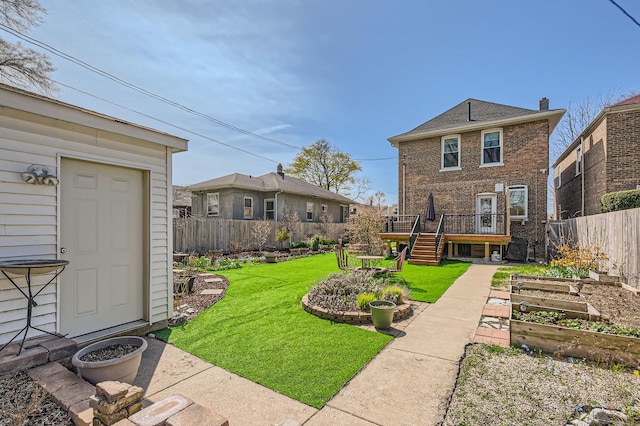 7525 S Crandon Ave, Chicago, IL 60649 - wooden terrace with a lawn and fence