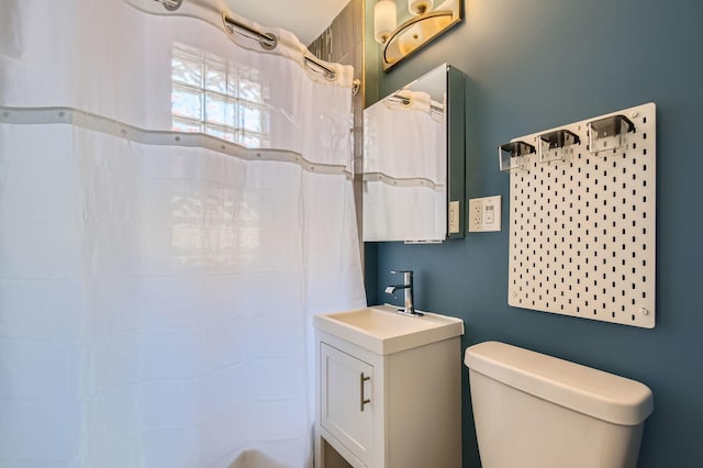 7525 S Crandon Ave, Chicago, IL 60649 - half bath with wood finished floors, vanity, and toilet