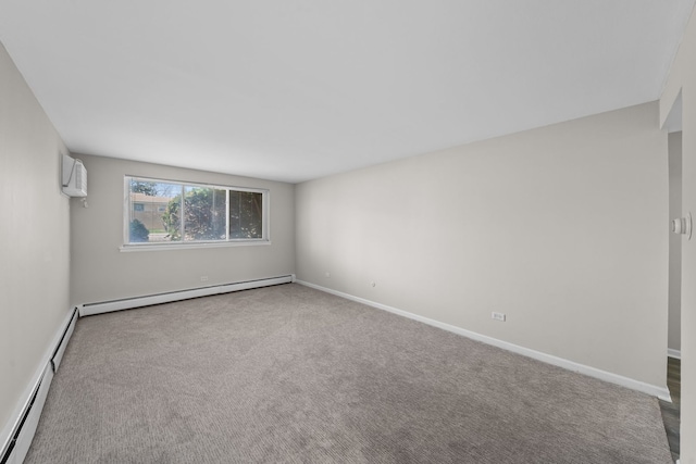 spare room featuring carpet, a baseboard heating unit, an AC wall unit, a baseboard radiator, and baseboards
