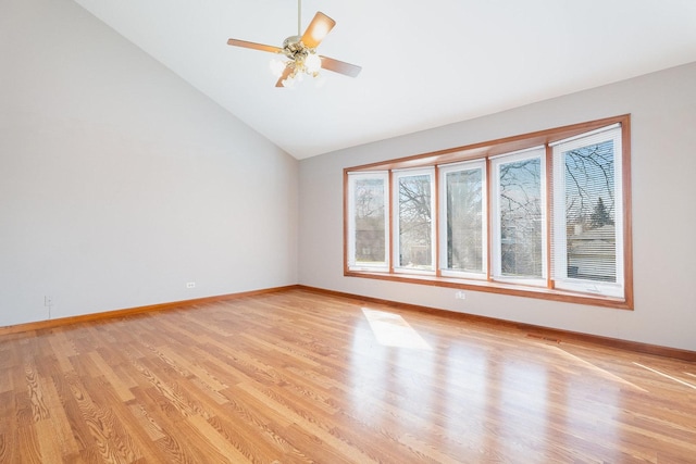 2084 Maplewood Cir, Naperville, IL 60563 - empty room with light wood-style floors, baseboards, a ceiling fan, and lofted ceiling