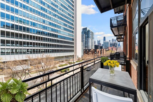 balcony featuring a view of city