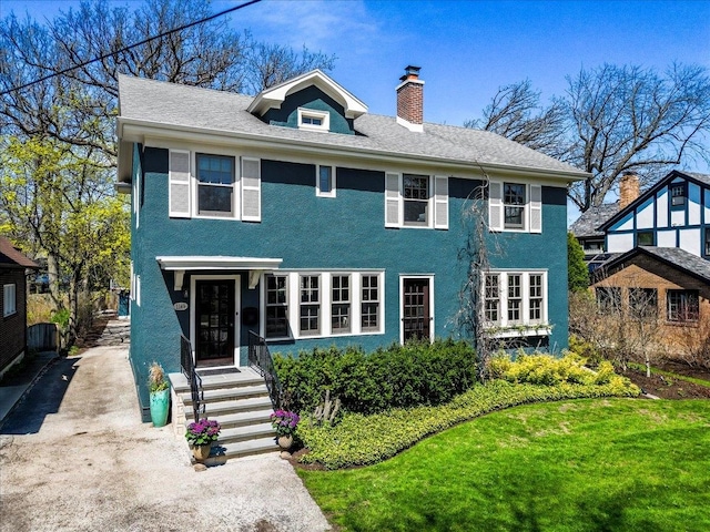 1149 Scott Ave, Winnetka, IL 60093 - view of front of house featuring a chimney and a front lawn