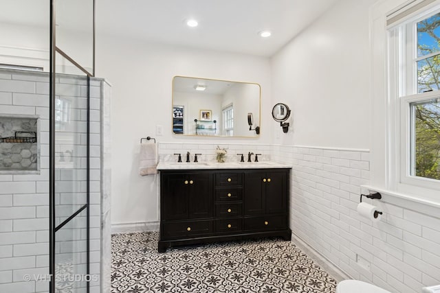 1149 Scott Ave, Winnetka, IL 60093 - bathroom with a sink, tile patterned floors, a stall shower, and double vanity