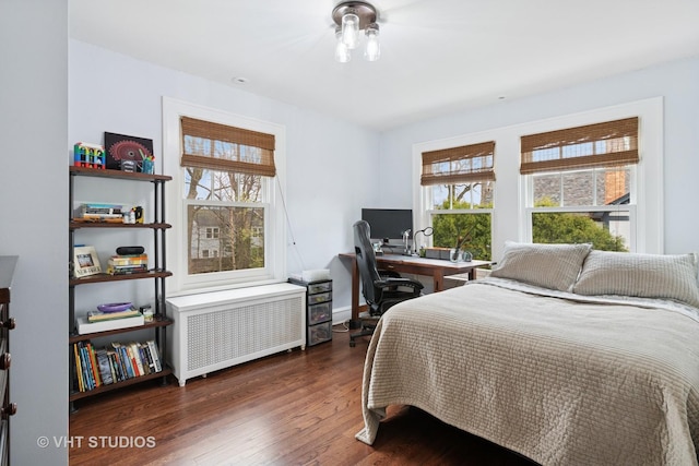 1149 Scott Ave, Winnetka, IL 60093 - bedroom with dark wood-style floors and radiator