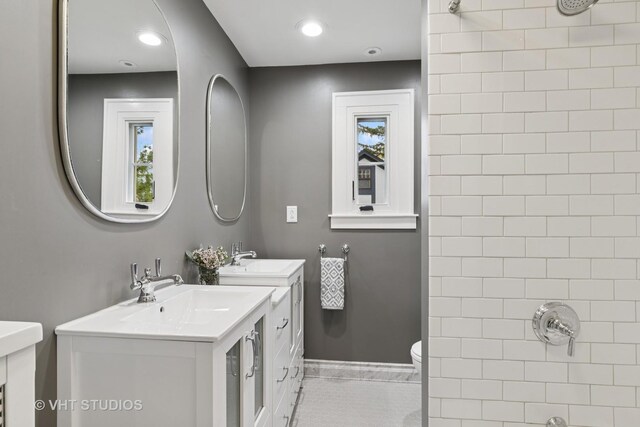 1149 Scott Ave, Winnetka, IL 60093 - full bathroom with a sink, walk in shower, toilet, and two vanities