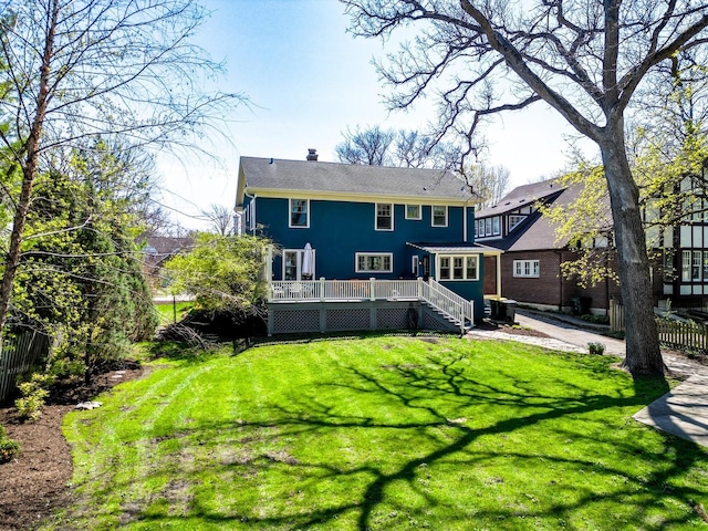 1149 Scott Ave, Winnetka, IL 60093 - back of property featuring fence, a chimney, a lawn, and a deck