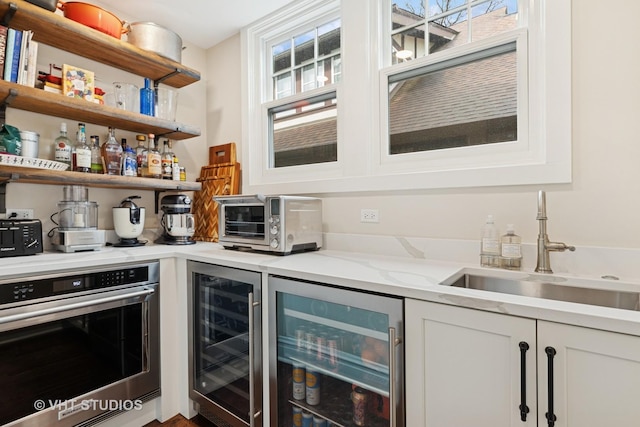1149 Scott Ave, Winnetka, IL 60093 - storage area featuring wine cooler, a toaster, and a sink