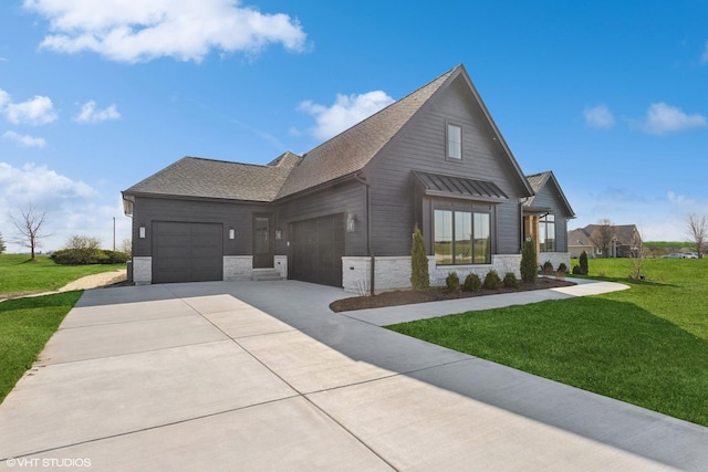 view of front of home featuring concrete driveway, stone siding, a front lawn, a garage, and a shingled roof