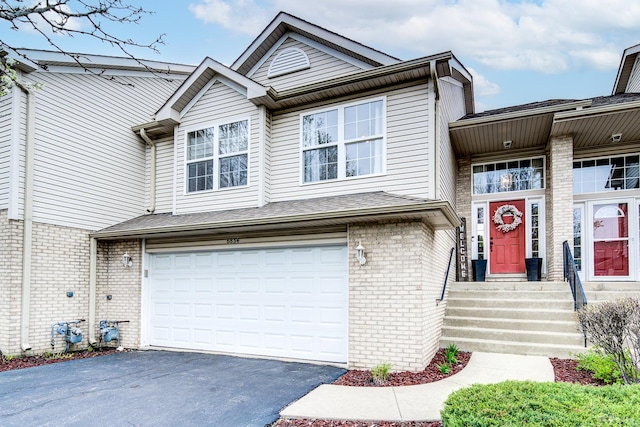 6834 Oak View Ct, Oak Forest, IL 60452 - townhome / multi-family property featuring brick siding, driveway, and an attached garage