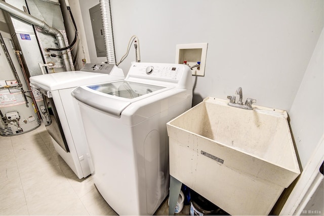 6834 Oak View Ct, Oak Forest, IL 60452 - washroom featuring gas water heater, electric panel, light tile patterned flooring, and washing machine and clothes dryer