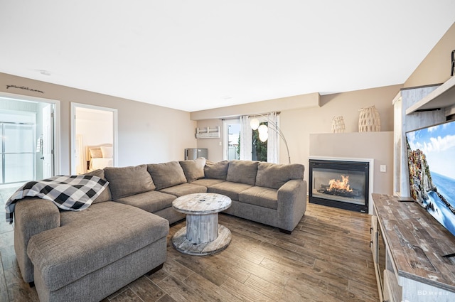 6834 Oak View Ct, Oak Forest, IL 60452 - living area featuring dark wood finished floors and a glass covered fireplace