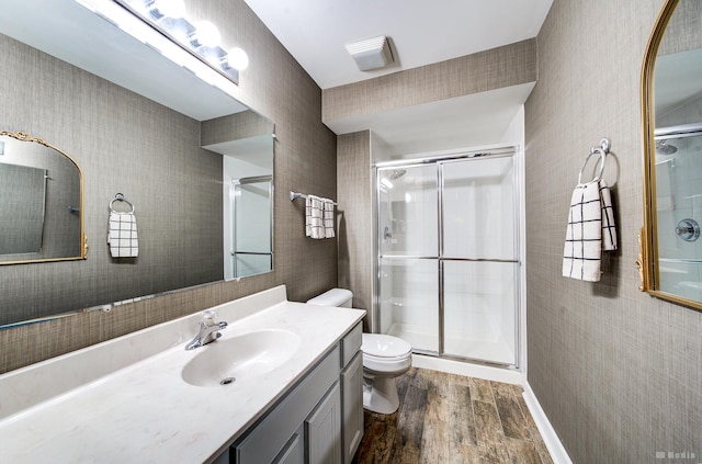 6834 Oak View Ct, Oak Forest, IL 60452 - full bathroom featuring wood finished floors, toilet, a stall shower, and vanity