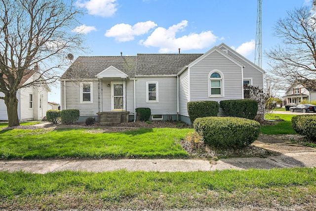 view of front of house with roof with shingles