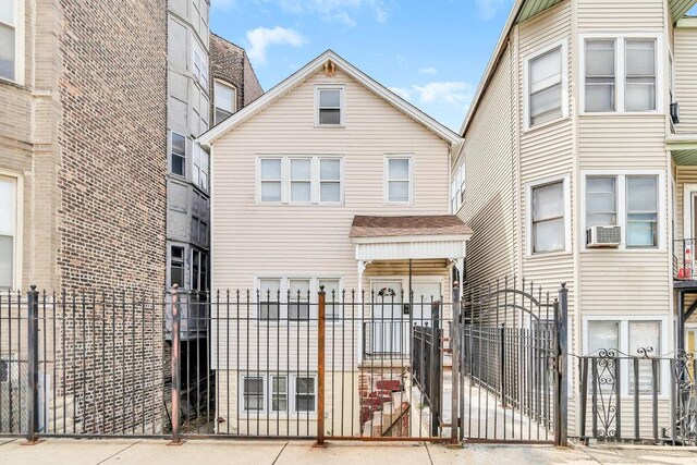 view of front of house featuring fence private yard