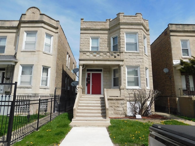 4134 W 21st Pl, Chicago, IL 60623 - view of front of house featuring fence and stone siding