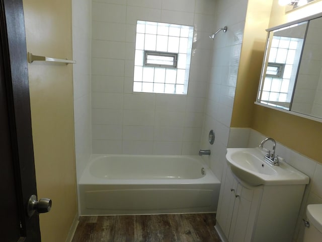 4134 W 21st Pl, Chicago, IL 60623 - full bath featuring toilet, bathtub / shower combination, vanity, and wood finished floors