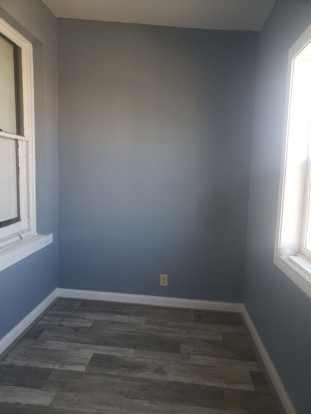 4134 W 21st Pl, Chicago, IL 60623 - empty room with baseboards and dark wood finished floors