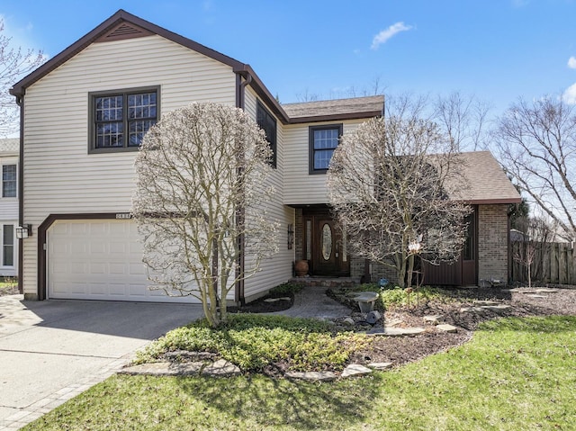 view of front of property with roof with shingles, driveway, fence, and an attached garage