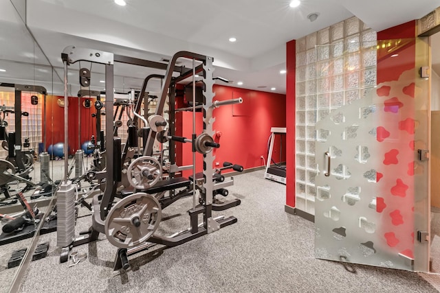 exercise room featuring recessed lighting and baseboards