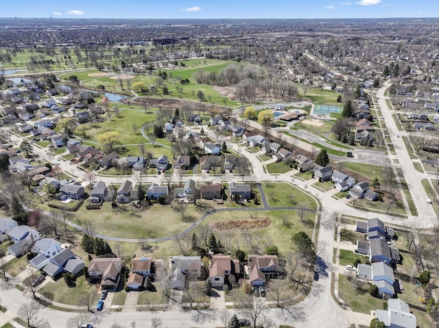 bird's eye view with a water view and a residential view