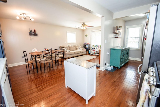 536 Evergreen Ln, Bradley, IL 60915 - kitchen featuring ceiling fan, baseboards, freestanding refrigerator, and dark wood finished floors