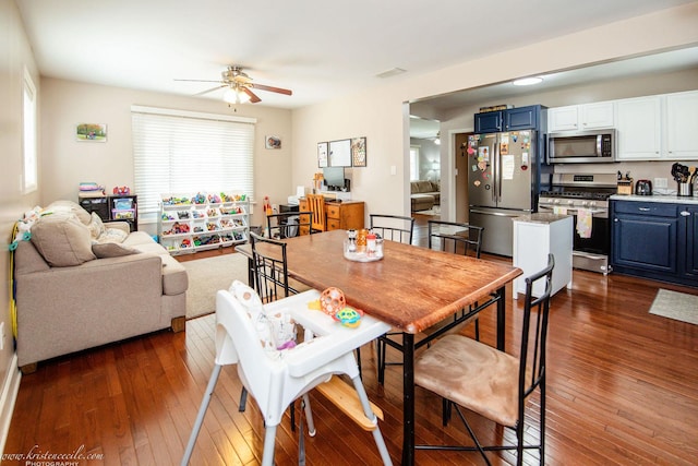 536 Evergreen Ln, Bradley, IL 60915 - dining area with dark wood-type flooring, visible vents, and ceiling fan