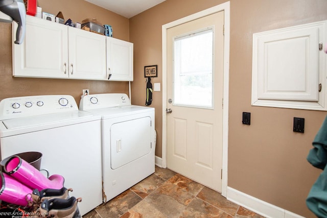 536 Evergreen Ln, Bradley, IL 60915 - laundry area featuring independent washer and dryer, stone finish flooring, baseboards, and cabinet space