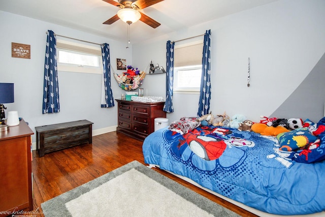 536 Evergreen Ln, Bradley, IL 60915 - bedroom featuring baseboards, multiple windows, a ceiling fan, and wood finished floors