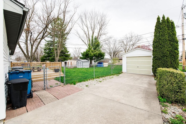 536 Evergreen Ln, Bradley, IL 60915 - exterior space featuring fence private yard, a garage, an outdoor structure, a gate, and driveway