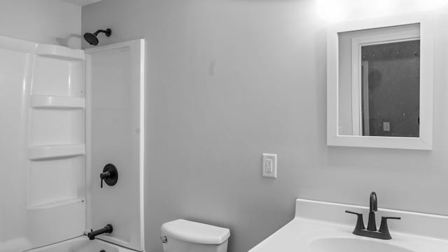 full bath featuring toilet, shower / bath combination, and vanity