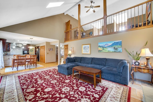 2894 Whispering Oaks Ct, Buffalo Grove, IL 60089 - living room featuring a ceiling fan, a skylight, high vaulted ceiling, beamed ceiling, and light wood-style floors