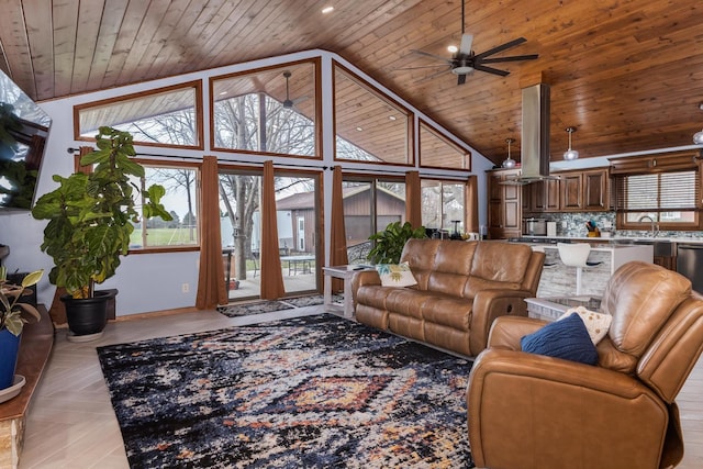 10690 E 1700 N Rd, Pontiac, IL 61764 - living room with high vaulted ceiling, baseboards, wood ceiling, and a ceiling fan