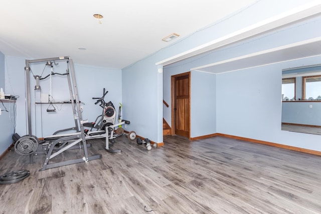 10690 E 1700 N Rd, Pontiac, IL 61764 - workout room featuring visible vents, baseboards, and wood finished floors