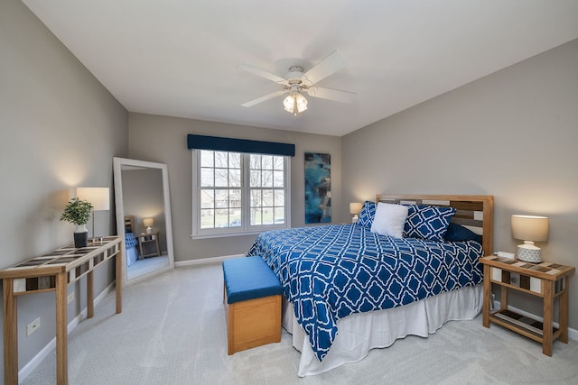 bedroom featuring carpet floors, baseboards, and ceiling fan