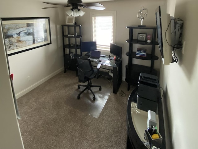 2110 Escalade Rd, Bloomington, IL 61705 - carpeted home office featuring baseboards and ceiling fan