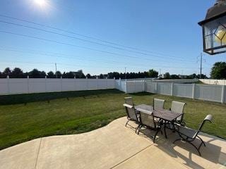 2110 Escalade Rd, Bloomington, IL 61705 - view of patio / terrace featuring outdoor dining space and a fenced backyard